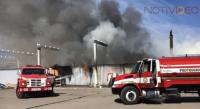 Se incendia plaza comercial Texticuitzeo
