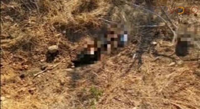 Localizan un cuerpo semi enterrado en una fosa