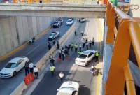 Joven se lanza de un puente en salida a Mil Cumbres y cae sobre una patrulla 