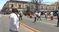 Comuneros de Arantepacua se manifiestan con destrozos en Morelia 